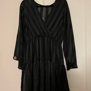 long sleeved sheer topped dress